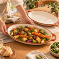 qyrvexul Ivory Oval Serving Platter with Handles — family dining scene